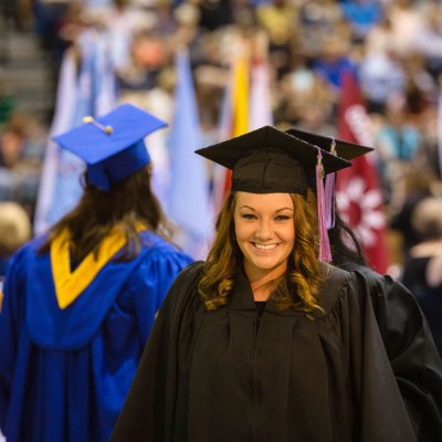 Student in Graduation Gown and Hat