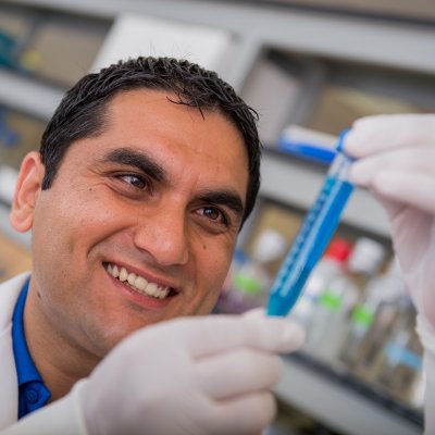 Nutrigenomics student measuring with test tube