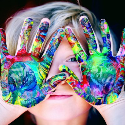 Child with painted hands