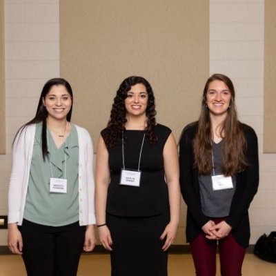 Three students pose at URSCAD