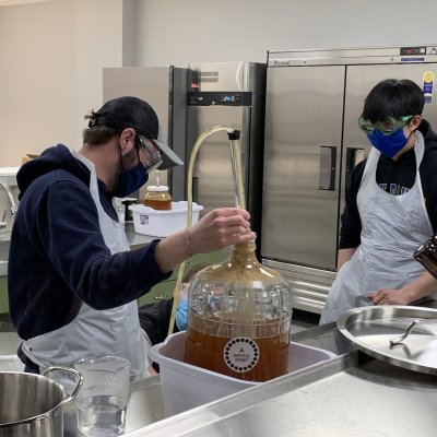 Students working in a brewing lab.