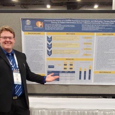 Kimball presenting poster at ASHP meeting