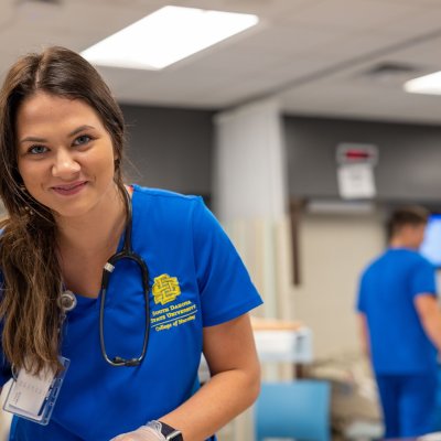 Nursing students working in a skills lab.