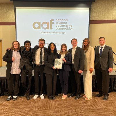 Students standing together for a group photo at the National Student Advertising Competition.