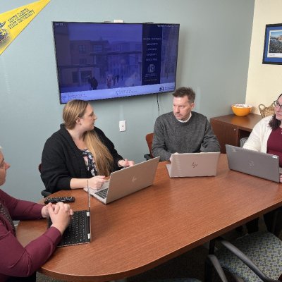 4 SDSU MPH faculty sitting around a table