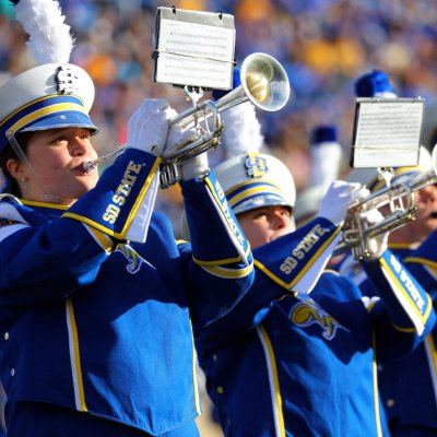 Trumpets perform during The Pride of the Dakotas halftime performance. 