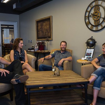 From left, Russ Chavez, Shayla Olson, Andy Ellis and Michelle Ruesink share a story at the Veterans Resource Center.