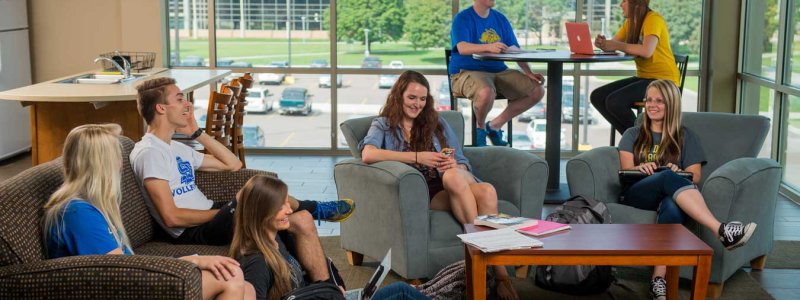 students in a day room of a residence hall