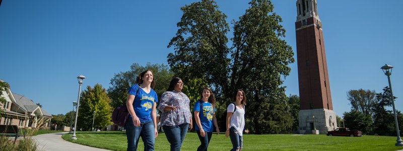 Students walking by Campanille