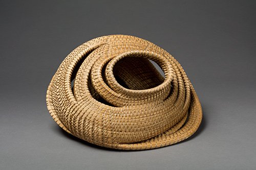 Basket by Debora Muhl, Untitled #983, 1998. Sea grass, sinew, gourd, beads, 9.75" x 16" x 12"