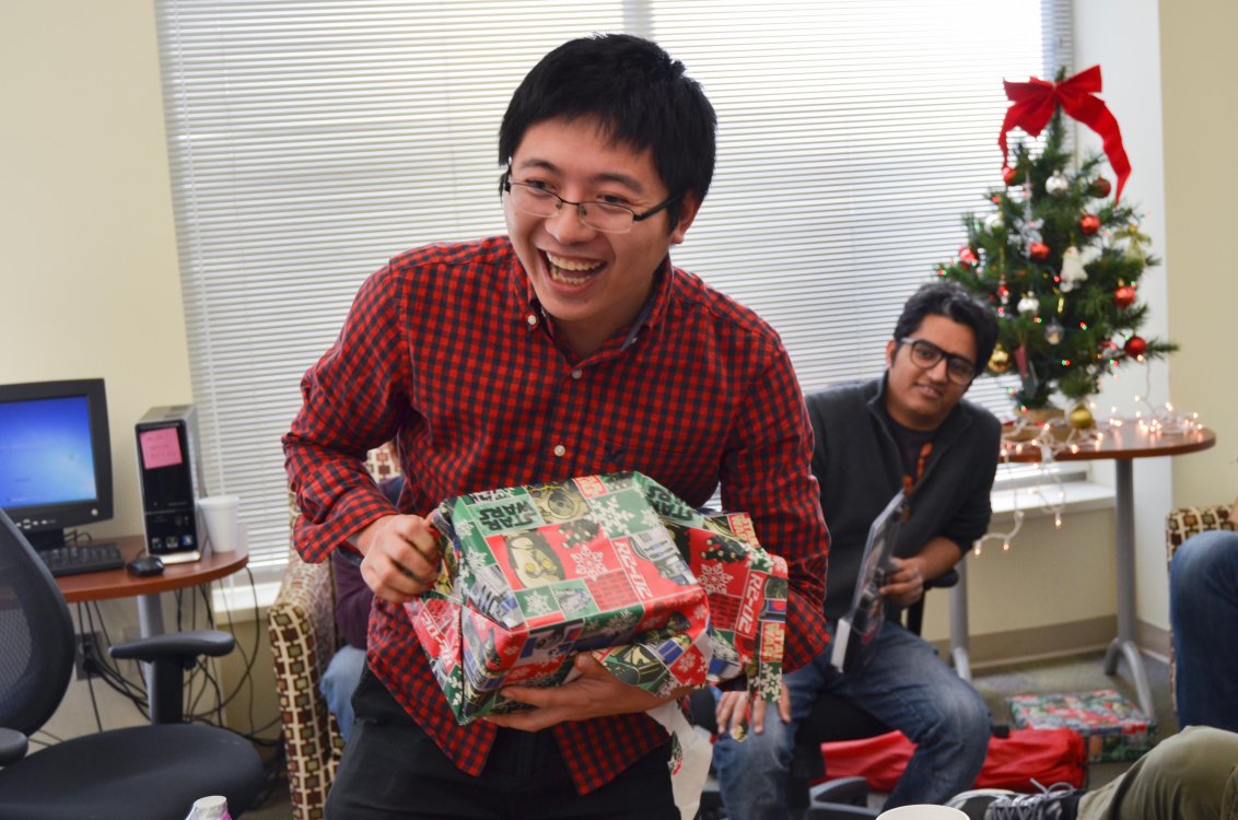 Student holding Christmas gift