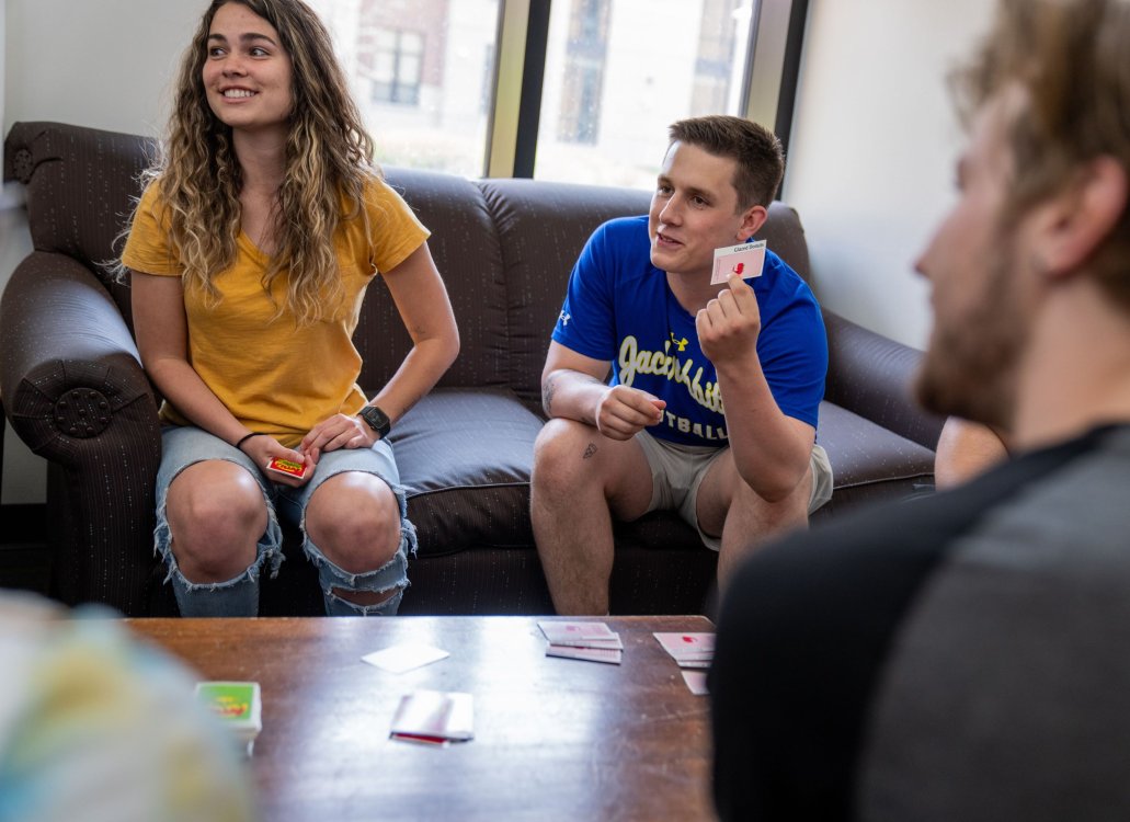 Students playing card game