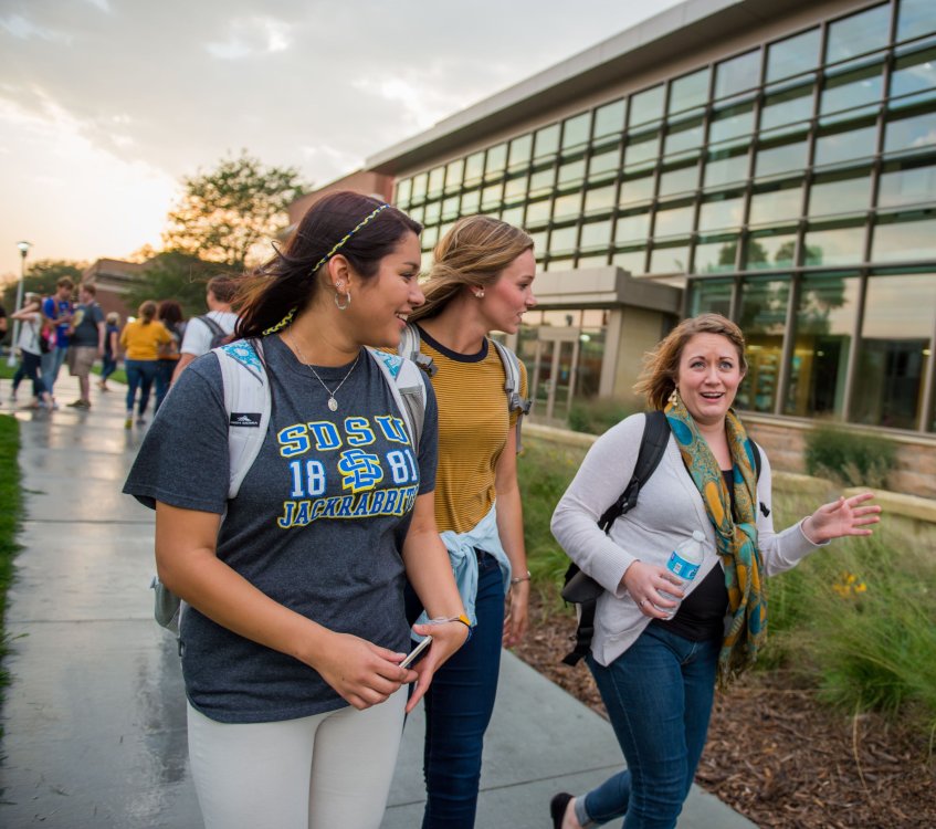 Students walking with instructor