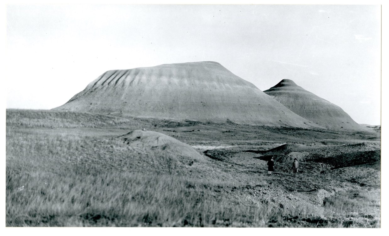 Eugene Buechel  “Viola Manning and Alice in front of two hills on way home from Cuny Table”  photograph, 1928  South Dakota Art Museum Collection 1984.04.18  Gift of St. Francis Mission in memory of Les Helgeland. SDAM