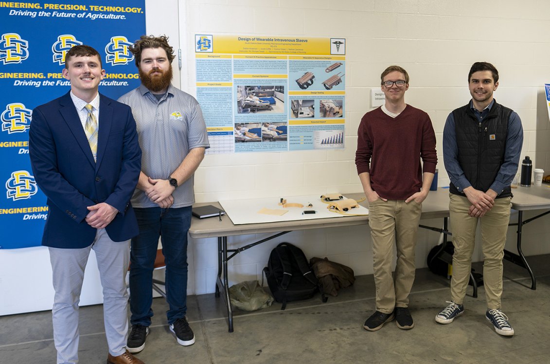 A four-man team of South Dakota State University mechanical engineering students has designed a wearable sleeve that will allow aspiring nurses to practice intravenous (IV) injections. The team includes, from left, Nathan Lawrence, Dalton Anderson, Connor Gress and Jonah Coffel.