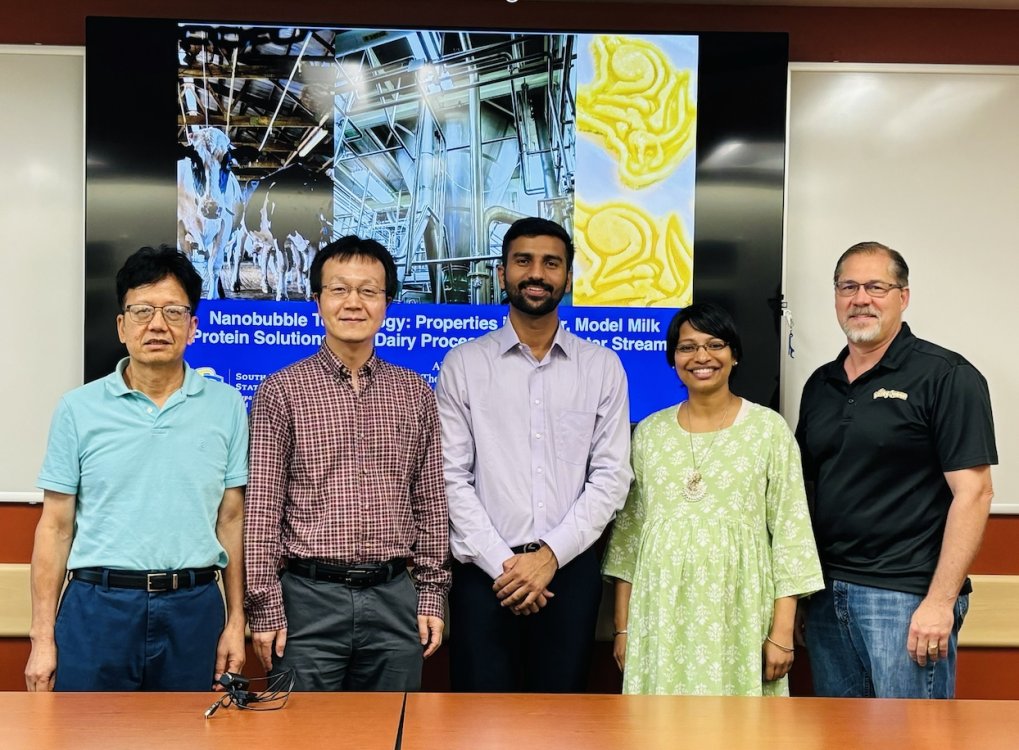 A group image taken with 1 graduate student and his committee members.