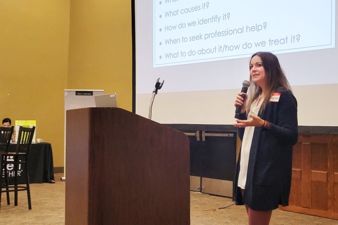 Amanda Reed, a licensed clinical psychologist in Sioux Falls, speaks on traumatic stress and emergency services at a first responder summit held Aug. 25 in Chamberlain.