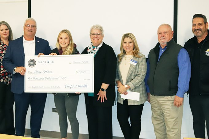 SDSU nursing student and South Dakota Air National Guard senior airman Ellise Otheim, third from left, is awarded a $5,000 Sanford Health Military and Veteran Scholarship in class Nov. 13.