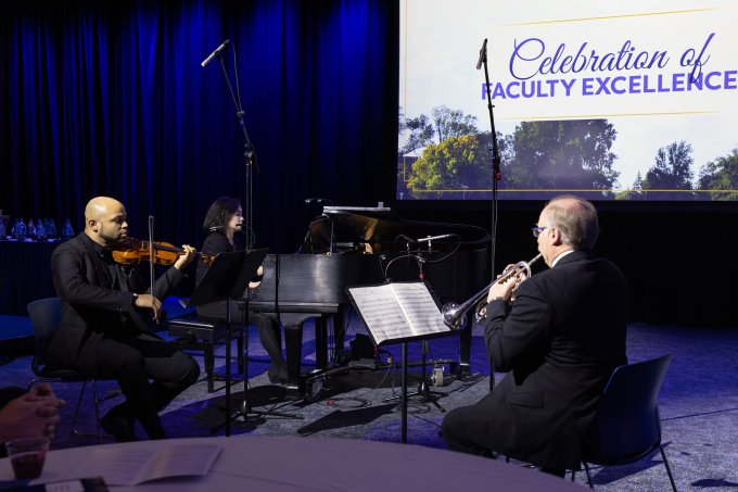 School of Performing Arts faculty members Immanuel Abraham, Xuan Kuang and David Reynolds perform at the 2024 Celebration of Faculty Excellence in Volstorff Ballroom at South Dakota State University.