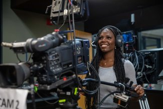 Student working in television studio